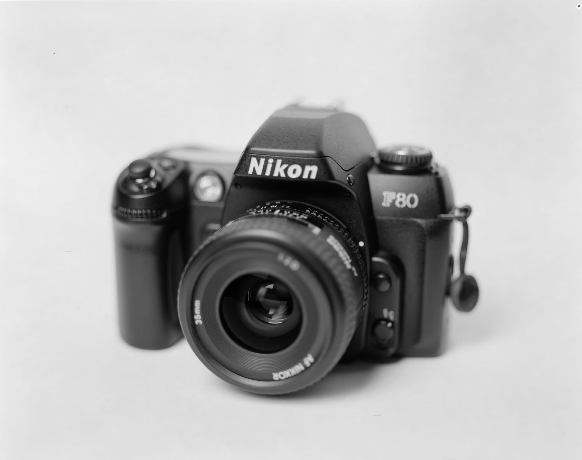 Nikon F80 on a light background